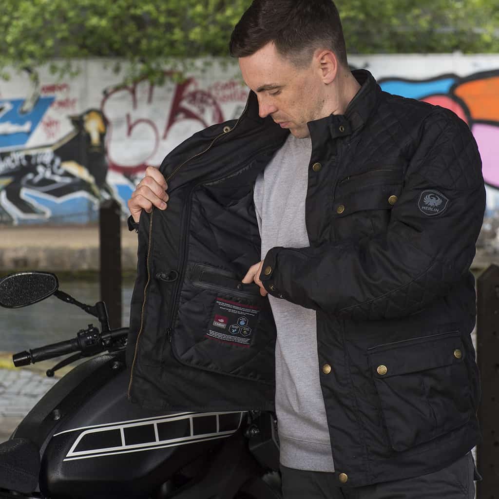 Lifestyle image of Merlin Edale waxed cotton motorcycle jacket