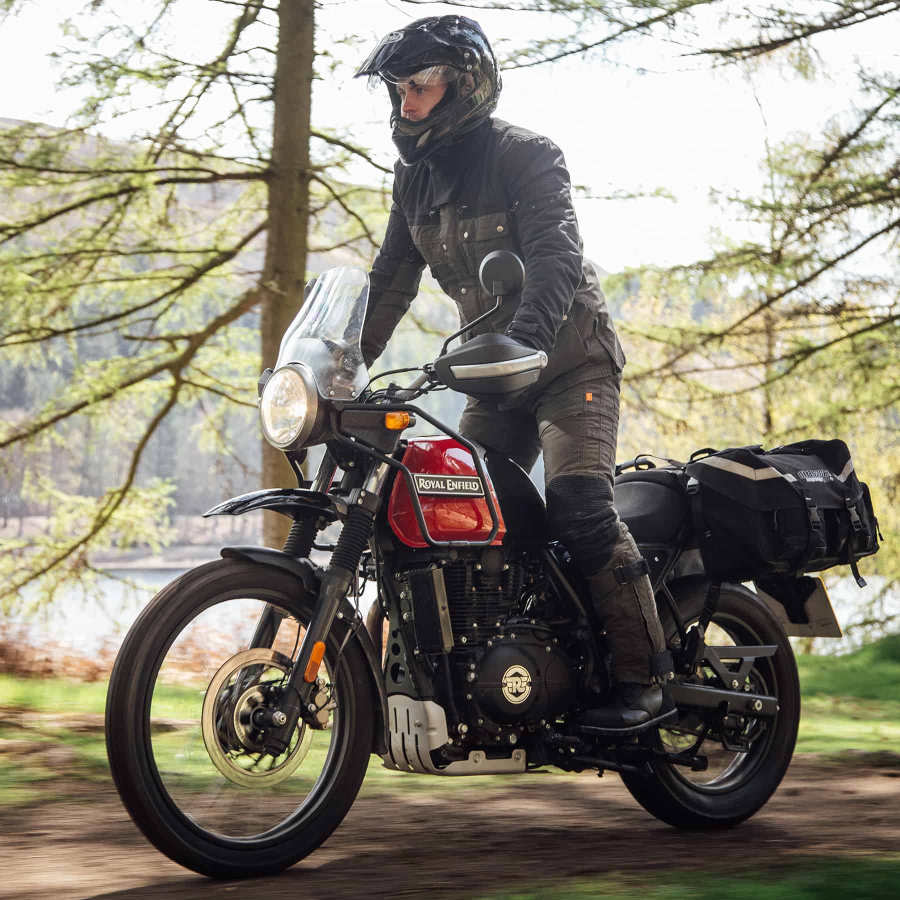 Riding image of Merlin Mahala Cordura jacket in black and olive